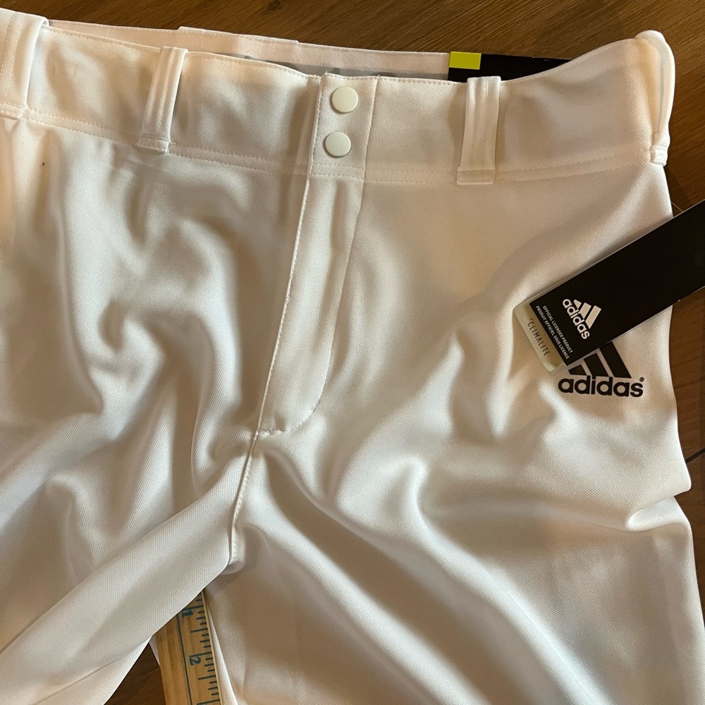 2 pair Adidas men’s size large baseball pants. 2 pair. Open bottom. Brand new.